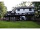 Charming exterior with large, newly stained deck overlooking a well-kept lawn at 4640 Calleigh Way, Snellville, GA 30039