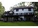 Picture of the rear exterior of the property featuring a spacious deck at 4640 Calleigh Way, Snellville, GA 30039