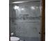 Modern bathroom with glass-enclosed shower and new fixtures at 4640 Calleigh Way, Snellville, GA 30039