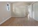This bedroom features hardwood floors, neutral paint, and a closet for storage at 1321 Mcclelland Ave, Atlanta, GA 30344