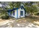 Charming single-story home with white siding, blue trim, and a cozy front porch at 1321 Mcclelland Ave, Atlanta, GA 30344
