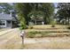 A front lawn view of the home, showcasing its quaint architecture at 1321 Mcclelland Ave, Atlanta, GA 30344