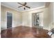The living room features wood floors, neutral paint, and a ceiling fan, offering a flexible living space at 1321 Mcclelland Ave, Atlanta, GA 30344
