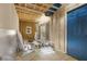 Renovation project in progress in room with open framing and blue door at the end at 1321 Mcclelland Ave, Atlanta, GA 30344