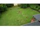 Expansive backyard featuring a large, well-maintained lawn and a potential fire pit area at 1342 Peggy Nw Ln, Conyers, GA 30012