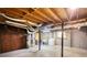 Spacious unfinished basement featuring utilities, with potential for storage or customization at 1342 Peggy Nw Ln, Conyers, GA 30012