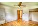 Bedroom with hardwood floors and attached bathroom and closet at 1342 Peggy Nw Ln, Conyers, GA 30012