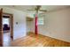 Bedroom showcasing hardwood floors, a ceiling fan, and a closet for storage at 1342 Peggy Nw Ln, Conyers, GA 30012