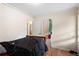 A bedroom with a comfortable atmosphere and ample natural light through the window at 1496 Meadowlark Dr, Decatur, GA 30032