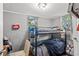 Cozy bedroom with bunk beds and natural light, creating a comfortable personal space at 1324 Almont Sw Dr, Atlanta, GA 30310
