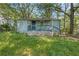 Exterior view of the home's front yard and porch with a bike at 1324 Almont Sw Dr, Atlanta, GA 30310