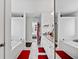 Bright bathroom has dual vanities, granite countertops, and a separate soaking tub and shower at 1742 Weatherbrook Cir, Lawrenceville, GA 30043