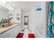 The primary bathroom showcases dual sinks, granite countertops, and a separate tub and shower at 1742 Weatherbrook Cir, Lawrenceville, GA 30043