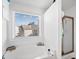 Bright bathroom features a soaking tub, a separate shower, and a large window for lots of natural light at 1742 Weatherbrook Cir, Lawrenceville, GA 30043