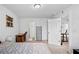 Bedroom featuring white walls, with view to bathroom and closet at 1742 Weatherbrook Cir, Lawrenceville, GA 30043
