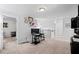 Spacious bonus room boasts neutral carpeting and ample natural light, great for an office or playroom at 1742 Weatherbrook Cir, Lawrenceville, GA 30043