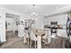 Bright kitchen with an island, stainless steel appliances, and a view to the dining area at 1742 Weatherbrook Cir, Lawrenceville, GA 30043