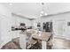 Bright kitchen with granite countertops, a large island, and stainless steel appliances at 1742 Weatherbrook Cir, Lawrenceville, GA 30043