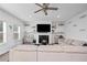 Comfortable living room featuring a fireplace, TV, and cozy seating at 1742 Weatherbrook Cir, Lawrenceville, GA 30043