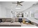 Open-concept living room with a view of the kitchen island and dining area at 1742 Weatherbrook Cir, Lawrenceville, GA 30043