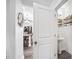 Half bathroom featuring a pedestal sink and stylish decor, adjacent to the kitchen at 1742 Weatherbrook Cir, Lawrenceville, GA 30043