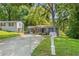 Charming single-story home featuring a well-maintained lawn, long driveway, and classic mailbox at 3530 Fairlane Nw Dr, Atlanta, GA 30331