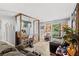 Inviting living room with comfortable gray sofa, hardwood floors, and good natural lighting at 3530 Fairlane Nw Dr, Atlanta, GA 30331