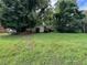 Home featuring a large, lush backyard, perfect for outdoor activities and relaxation at 4402 Highland Rd, Decatur, GA 30035