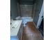 Bathroom features a tub and shower combo, a white toilet and vanity with updated plumbing fixtures at 4402 Highland Rd, Decatur, GA 30035