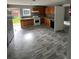 Well-lit kitchen with ample wood cabinetry, white appliances, and neutral backsplash at 4402 Highland Rd, Decatur, GA 30035