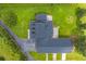 Overhead shot of home displaying the layout of the roof and the surrounding asphalt driveway at 500 Coleman Mill Rd, Carrollton, GA 30116