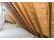 Unfinished attic space with exposed wooden beams at 500 Coleman Mill Rd, Carrollton, GA 30116