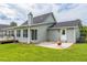 Backyard with a concrete patio, providing a great space for outdoor dining and gatherings at 500 Coleman Mill Rd, Carrollton, GA 30116