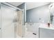 Accessible bathroom featuring a walk-in shower, sleek vanity, and white subway tile accents at 500 Coleman Mill Rd, Carrollton, GA 30116