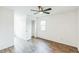 Bright bedroom featuring wood-look flooring, ceiling fan and white trim at 500 Coleman Mill Rd, Carrollton, GA 30116