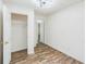 Bedroom featuring wood-look flooring and closet at 500 Coleman Mill Rd, Carrollton, GA 30116