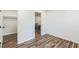 Bedroom featuring a view into a closet and an adjacent room, showcasing the home's layout at 500 Coleman Mill Rd, Carrollton, GA 30116