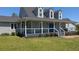 Inviting home with a spacious porch, offering outdoor seating with lovely curb appeal at 500 Coleman Mill Rd, Carrollton, GA 30116