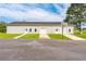 Detached three-car garage with basketball hoop and adjacent yard space at 500 Coleman Mill Rd, Carrollton, GA 30116