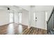 Bright living room features wood floors, shiplap walls, and large windows for natural light at 500 Coleman Mill Rd, Carrollton, GA 30116