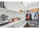 Spacious walk-in closet with organized shelving and hanging storage for clothes and accessories at 500 Coleman Mill Rd, Carrollton, GA 30116