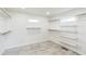 Large walk-in closet featuring ample shelving, rod for hanging clothes, and overhead lighting at 500 Coleman Mill Rd, Carrollton, GA 30116