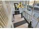 Bright lobby featuring a chandelier, staircase, and large windows at 2479 Peachtree Road Northeast Ne Rd # 402, Atlanta, GA 30305
