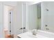 Bathroom featuring a white single sink vanity and a large mirror above it at 3761 Lake Point Blvd, Suwanee, GA 30024