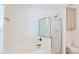 Bright bathroom features a separate tub and glass enclosed shower at 3761 Lake Point Blvd, Suwanee, GA 30024