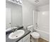 Clean bathroom with a shower-tub combo, neutral walls and flooring at 2226 Exchange Se Pl, Conyers, GA 30013