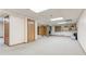 Large basement area featuring storage shelves, exercise equipment, and ample room at 730 Ponderosa Ct, Fayetteville, GA 30214