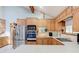 Well-equipped kitchen featuring ample counter space, wood cabinets, and modern appliances at 730 Ponderosa Ct, Fayetteville, GA 30214