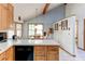 Kitchen with stainless steel dishwasher and countertops with breakfast nook and lots of natural light at 730 Ponderosa Ct, Fayetteville, GA 30214