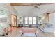 Open living room with hardwood floors, large windows, comfortable seating, and vaulted ceilings at 730 Ponderosa Ct, Fayetteville, GA 30214